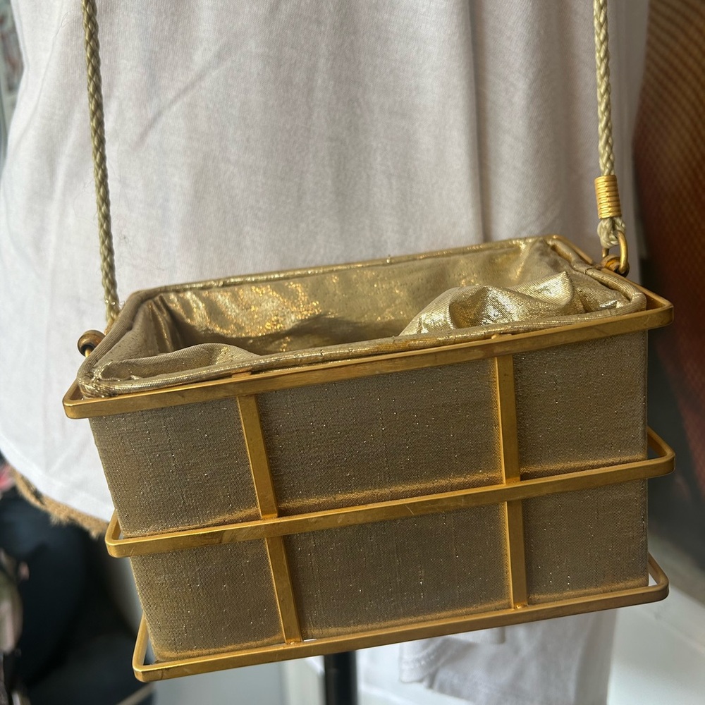 Odd & interesting Y & L women’s square clutch handbag. Cute, but strange.